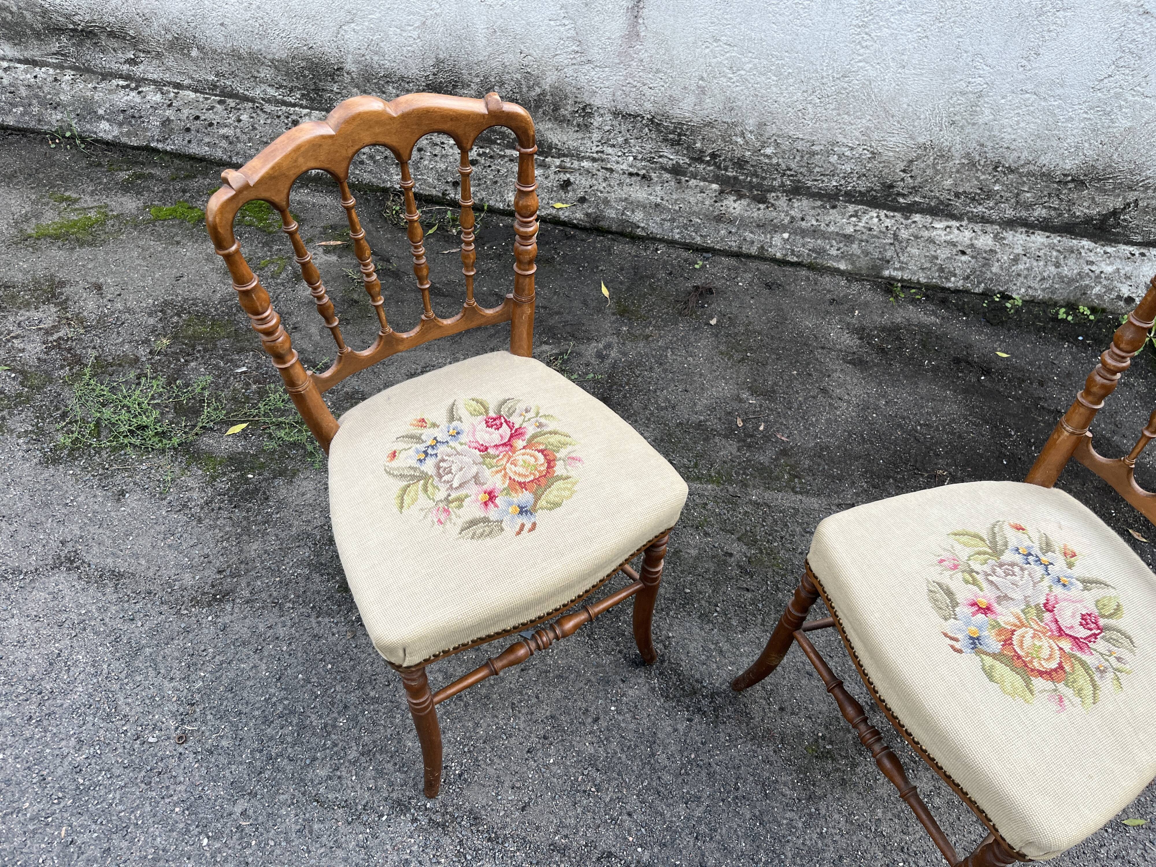 Pair of antique turned wooden chairs, embroidered upholstered seats