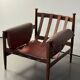 Fauteuil Amiral d'Eric Merthen, en cuir et palissandre