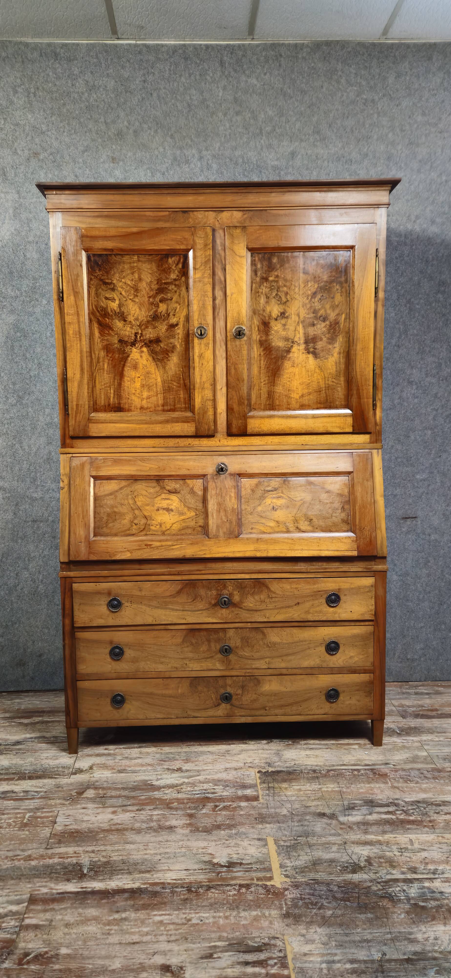 Secretary with three bodies in walnut from the Louis XVI period.
