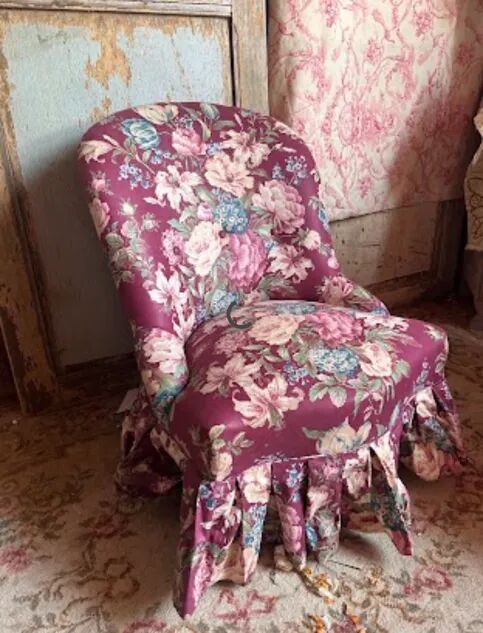 Antique floral upholstered armchair – traditional upholstery renovation.