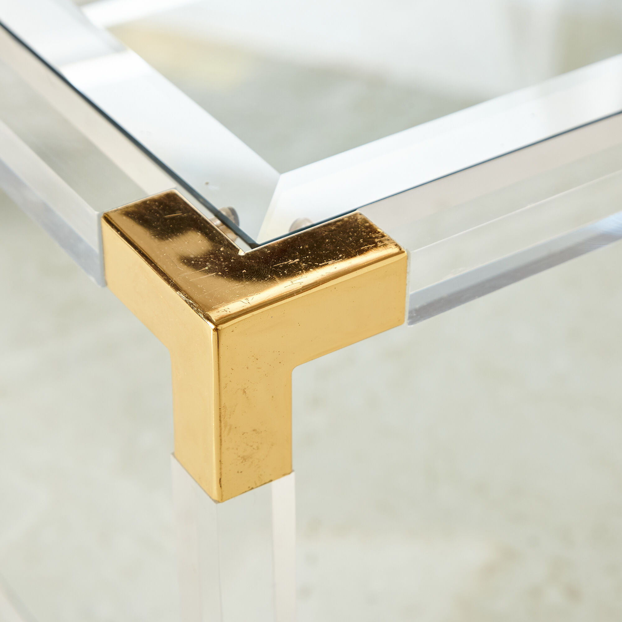 Glass and brass coffee table