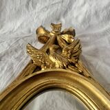 Vintage Empire style wall mirror in gold resin