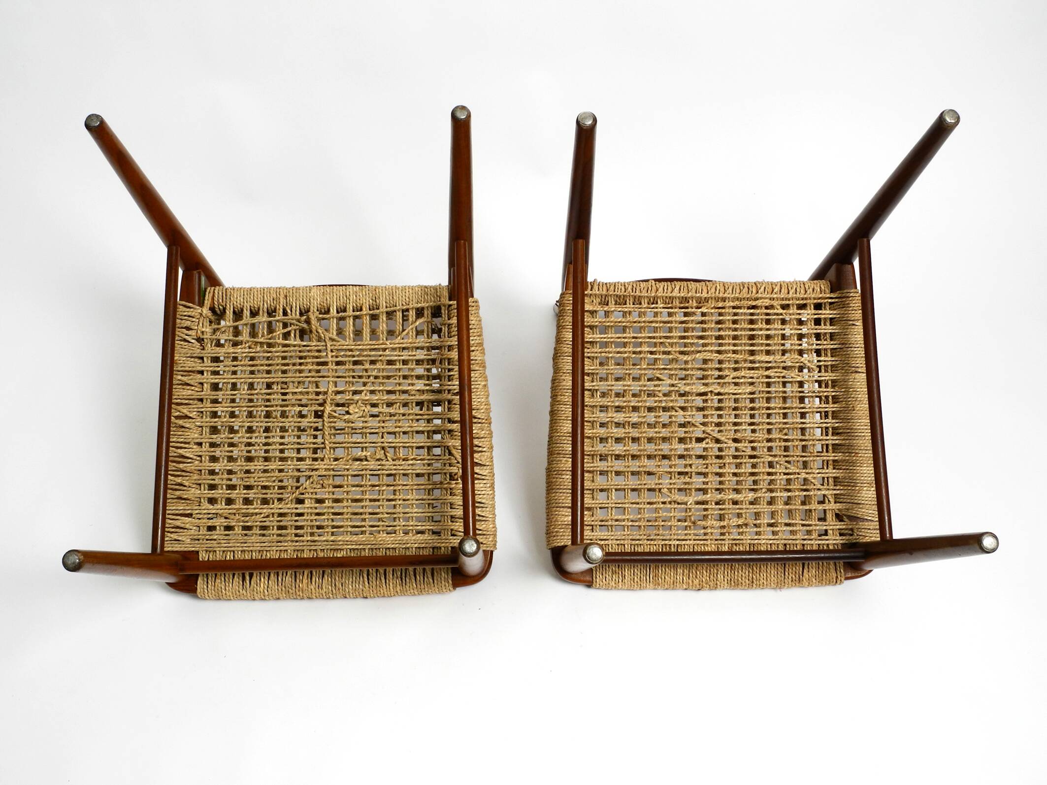 Two original 1960s Wilkhahn chairs made of walnut with wicker cane