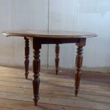 Round fruit wood table with extensions
