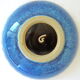 Cut or pocket in polychrome varnished sandstone with a blue and floral decoration
