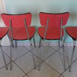 Table in red formica, 4 roc chairs, 2 extension cords, 2 drawers 60