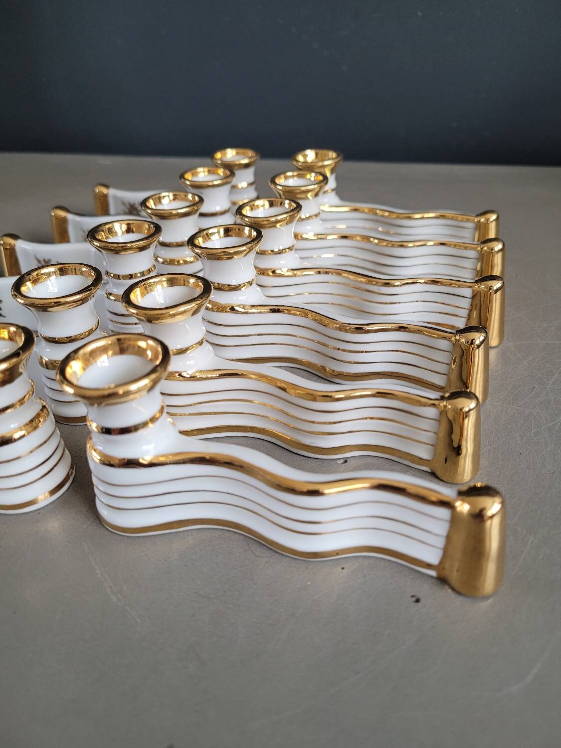12 Limoges art porcelain knife rests in their case
