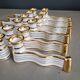 12 Limoges art porcelain knife rests in their case