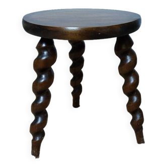 Wooden tripod stool with twisted legs