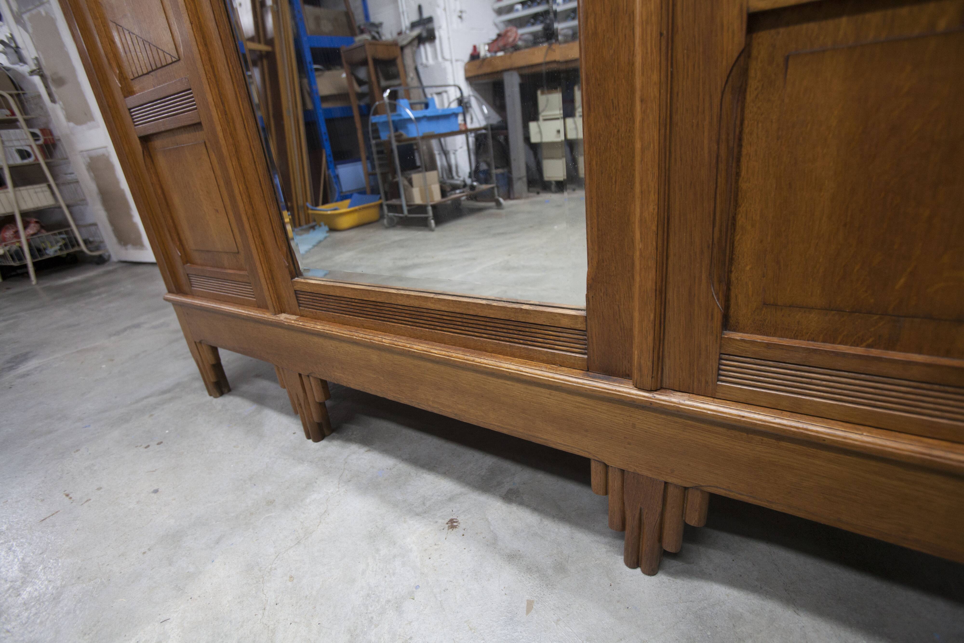 Art Deco carved oak wardrobe - Flemish workshop circa 1930