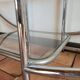 Bauhaus-style chrome round shelf