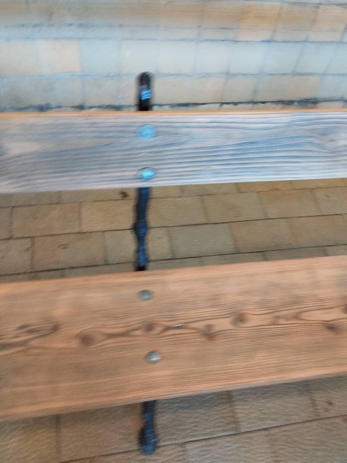 Antique garden bench with cast iron legs