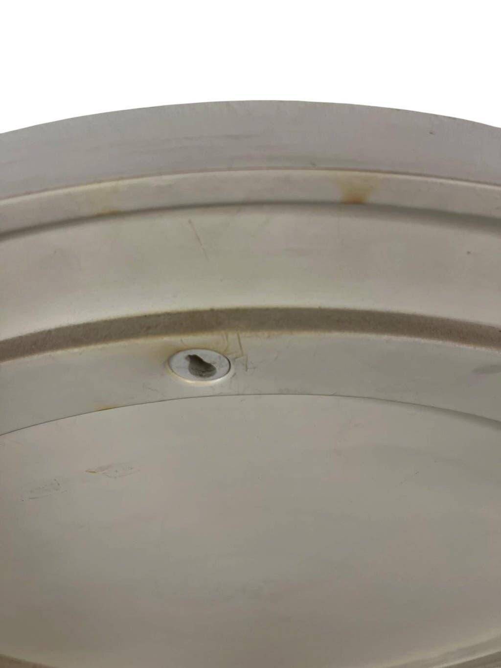 Beige vintage round mirror in a space style / wall mirror
