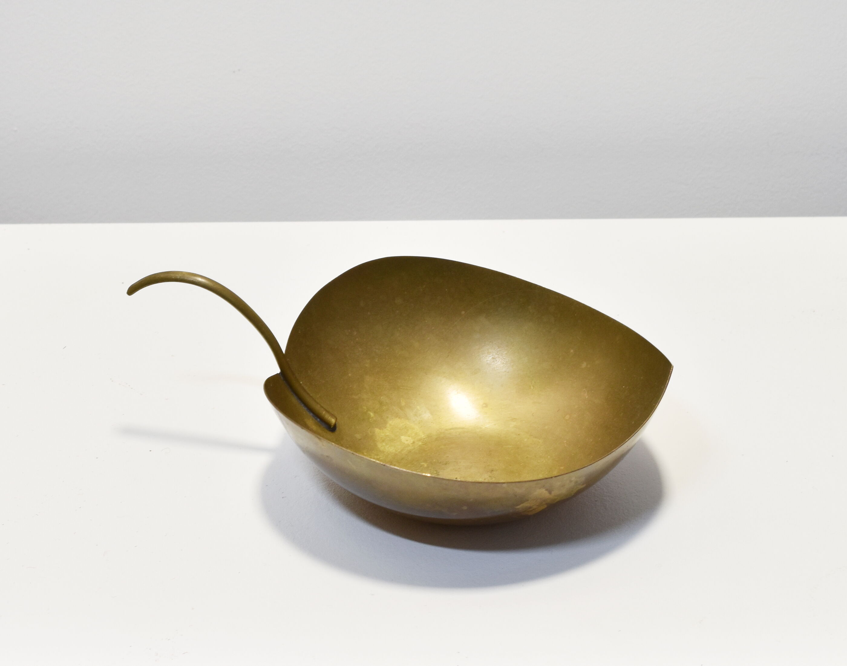 Empty brass leaf pocket