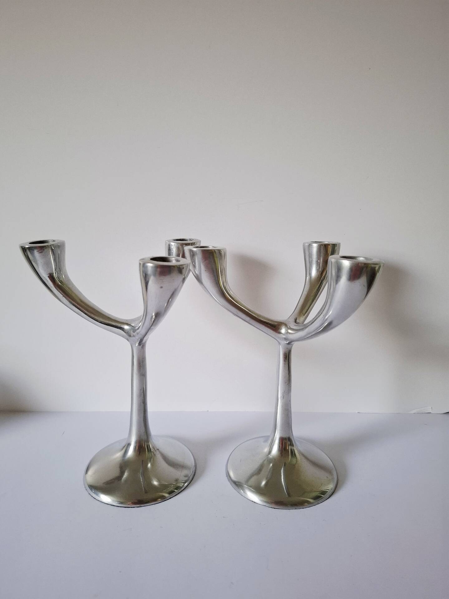 Vintage aluminium candlestick duo