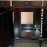 Contemporary Chinese buffet with a marble top and space for a mini-fridge.