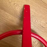 Red Baumann parrot coat rack
