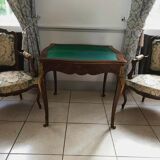 Console transforming into a 19th century Louis XV style gaming table