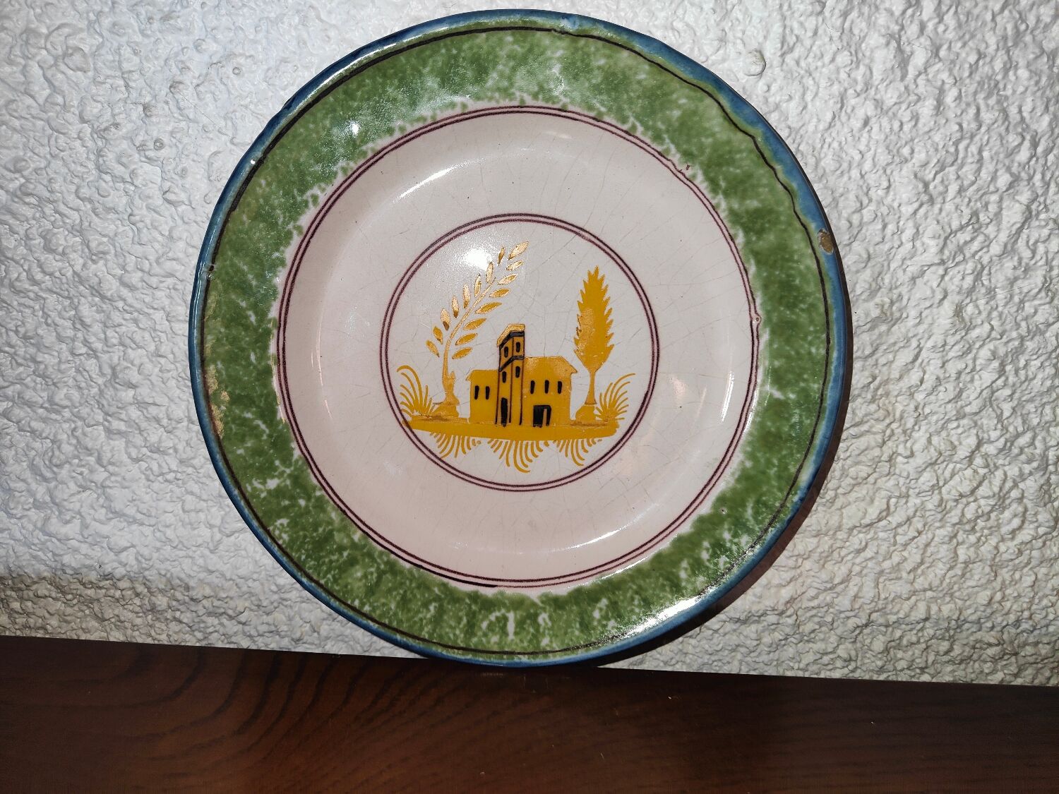 Nevers earthenware plate? XIXth Century with palace decoration