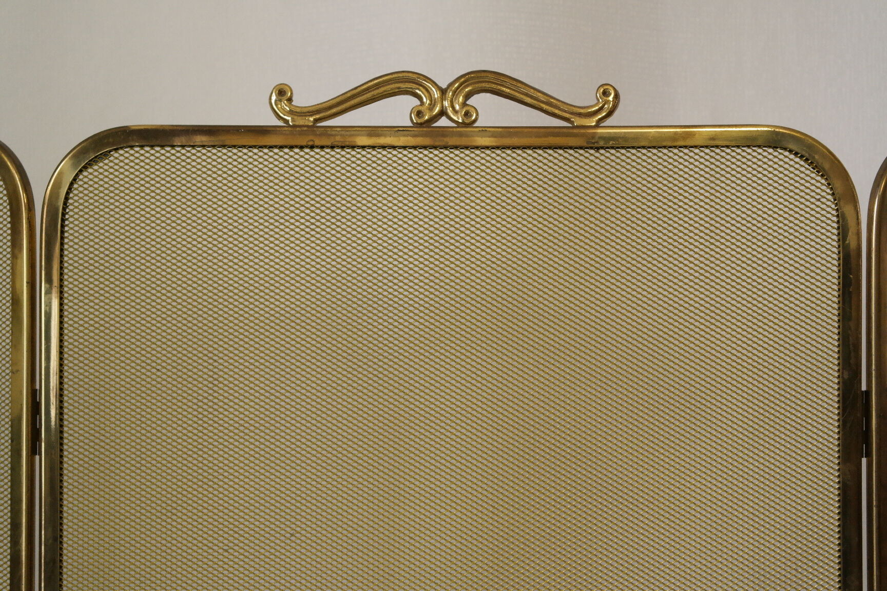 Vintage brass chimney firewall