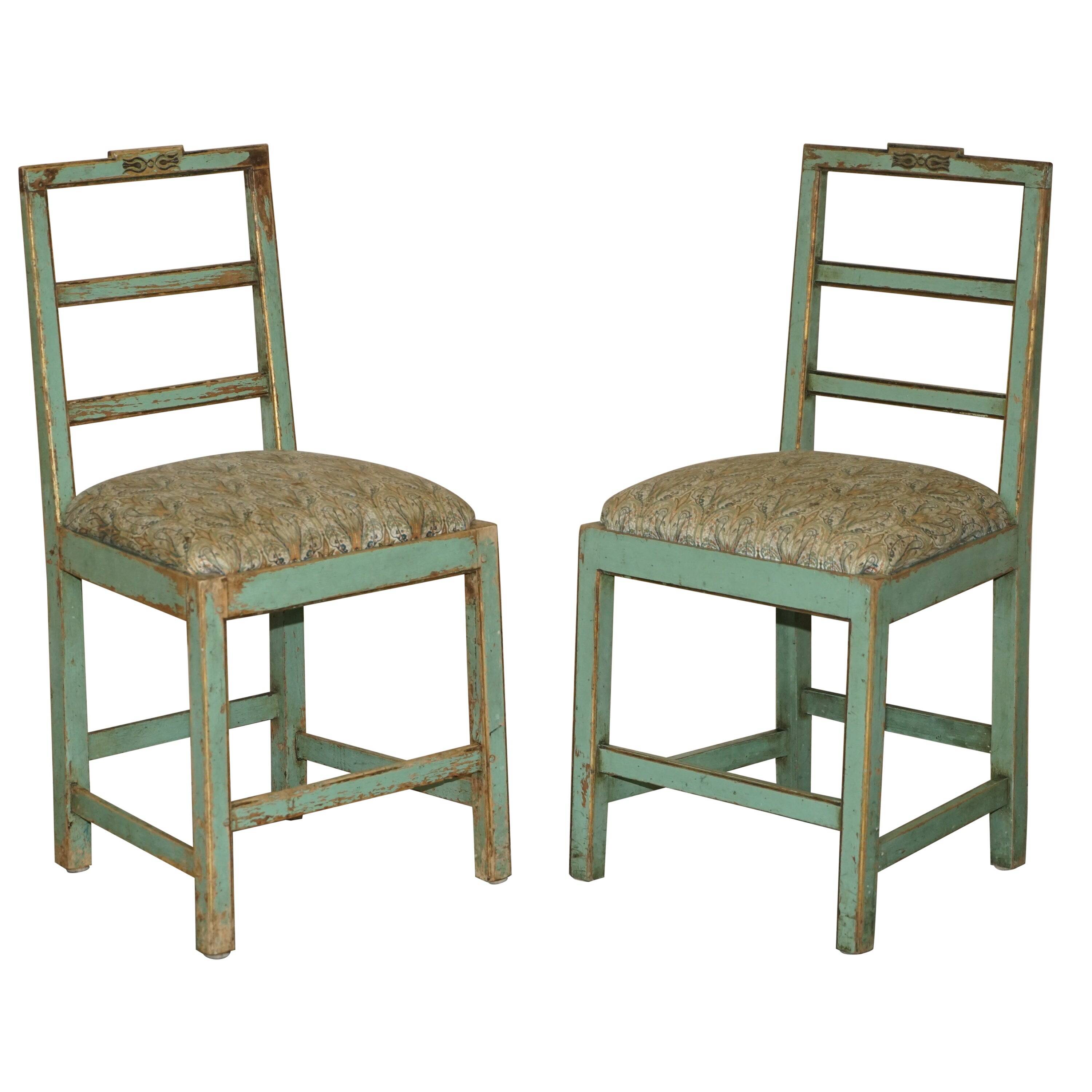 Pair of antique French chairs with original paint.