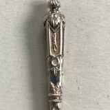 12 teaspoons silver metal