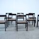 Set of eight black lacquered dining chairs