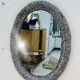Vintage oval wicker mirror from the 1960s.