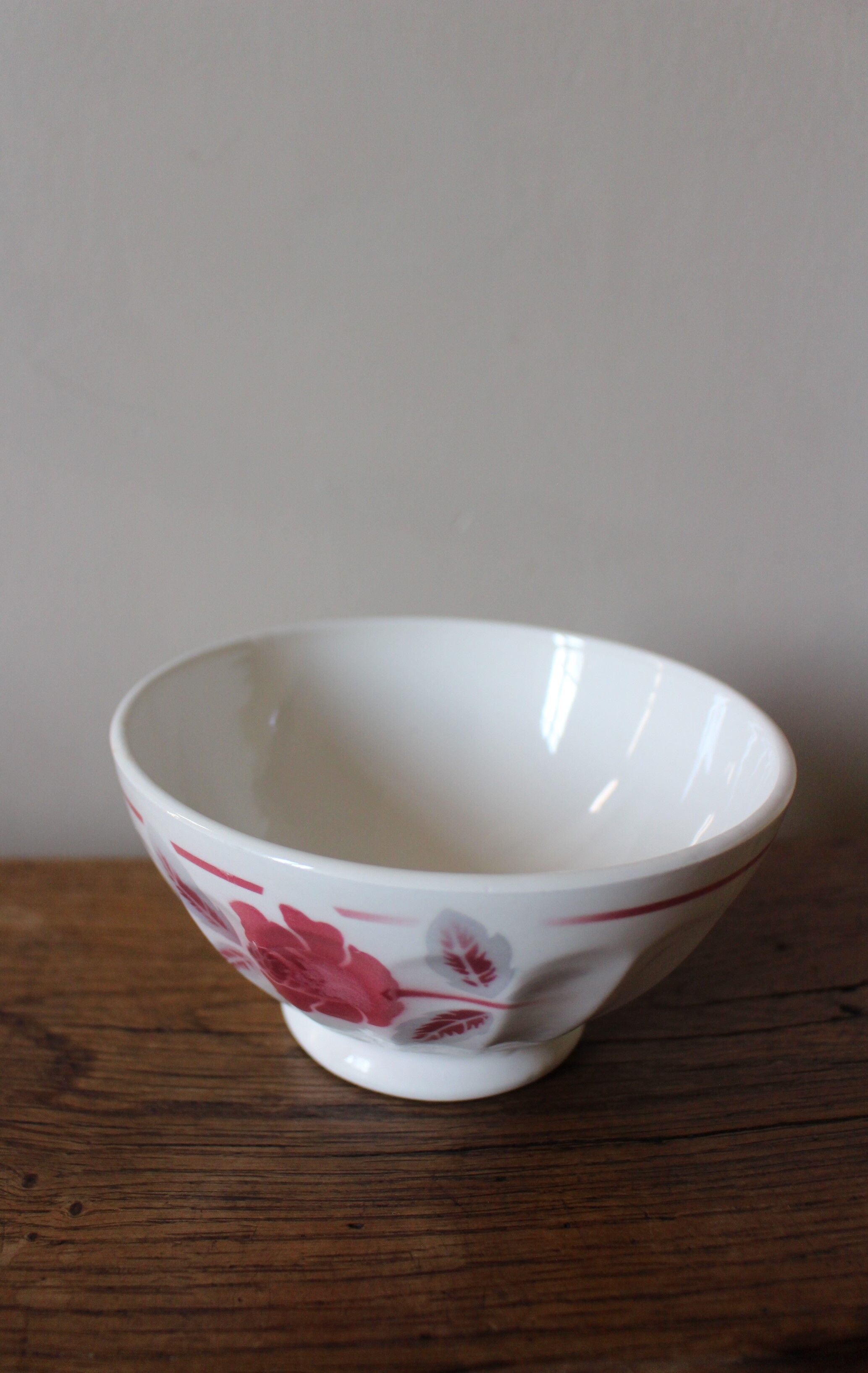 Old standing bowl pink red blue foliage