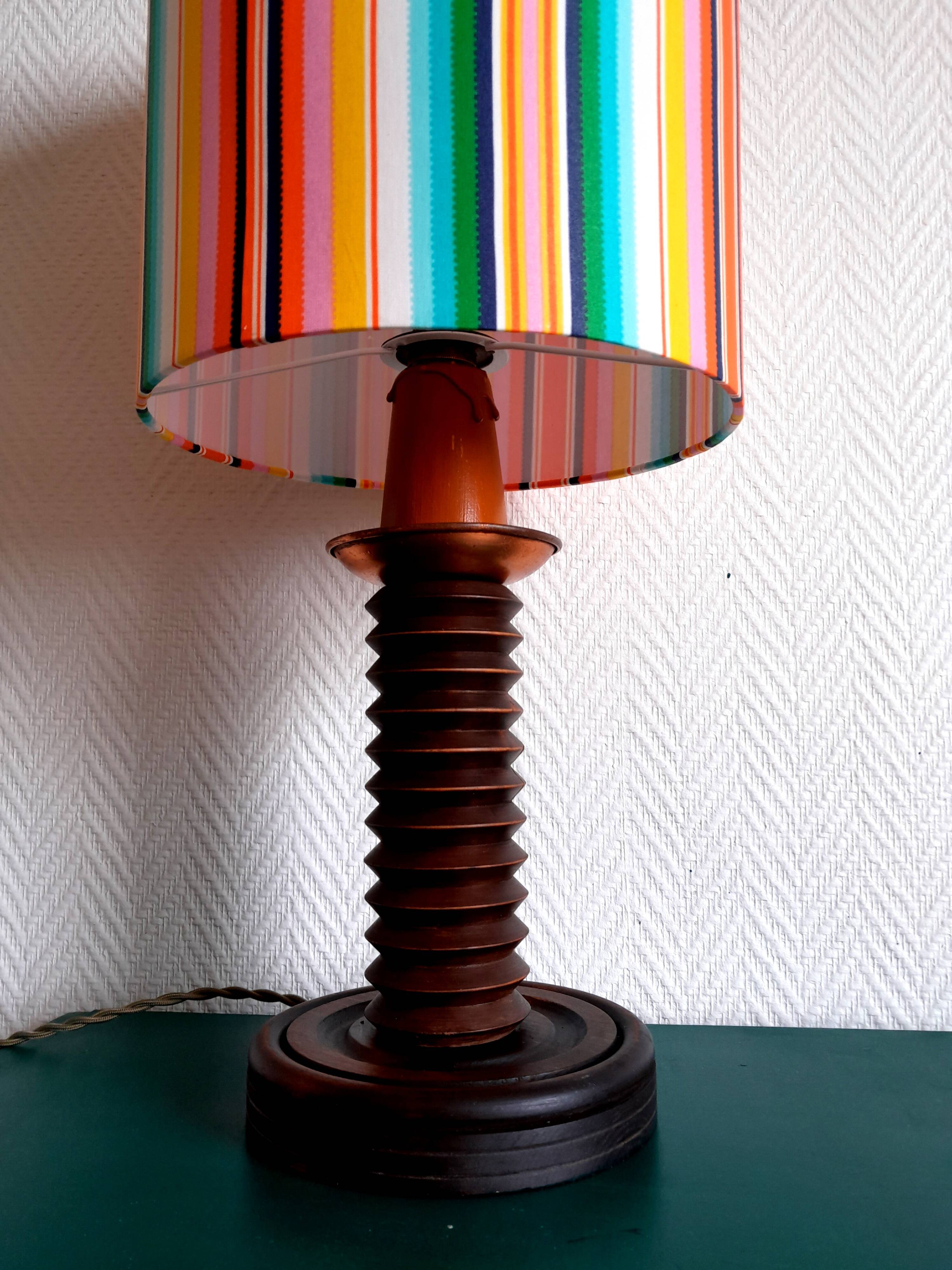 Wooden lamp with striped lampshade