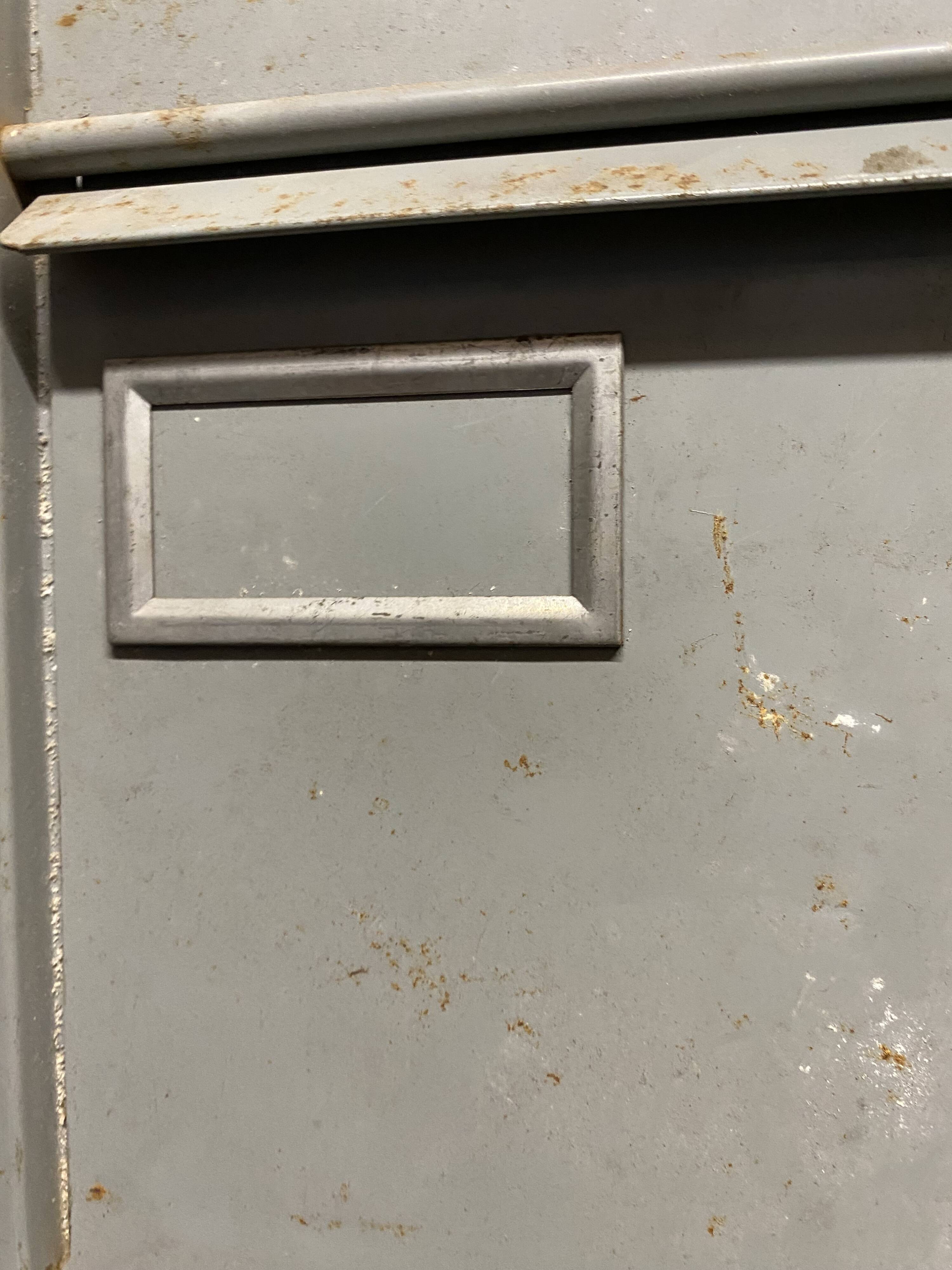 Industrial metal workshop desk storage unit with 10 flaps, 1950s.