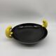 Large vintage black ceramic bowl with yellow parakeets, Vallauris.