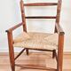 Vintage wooden and straw children's armchair, 1950s.