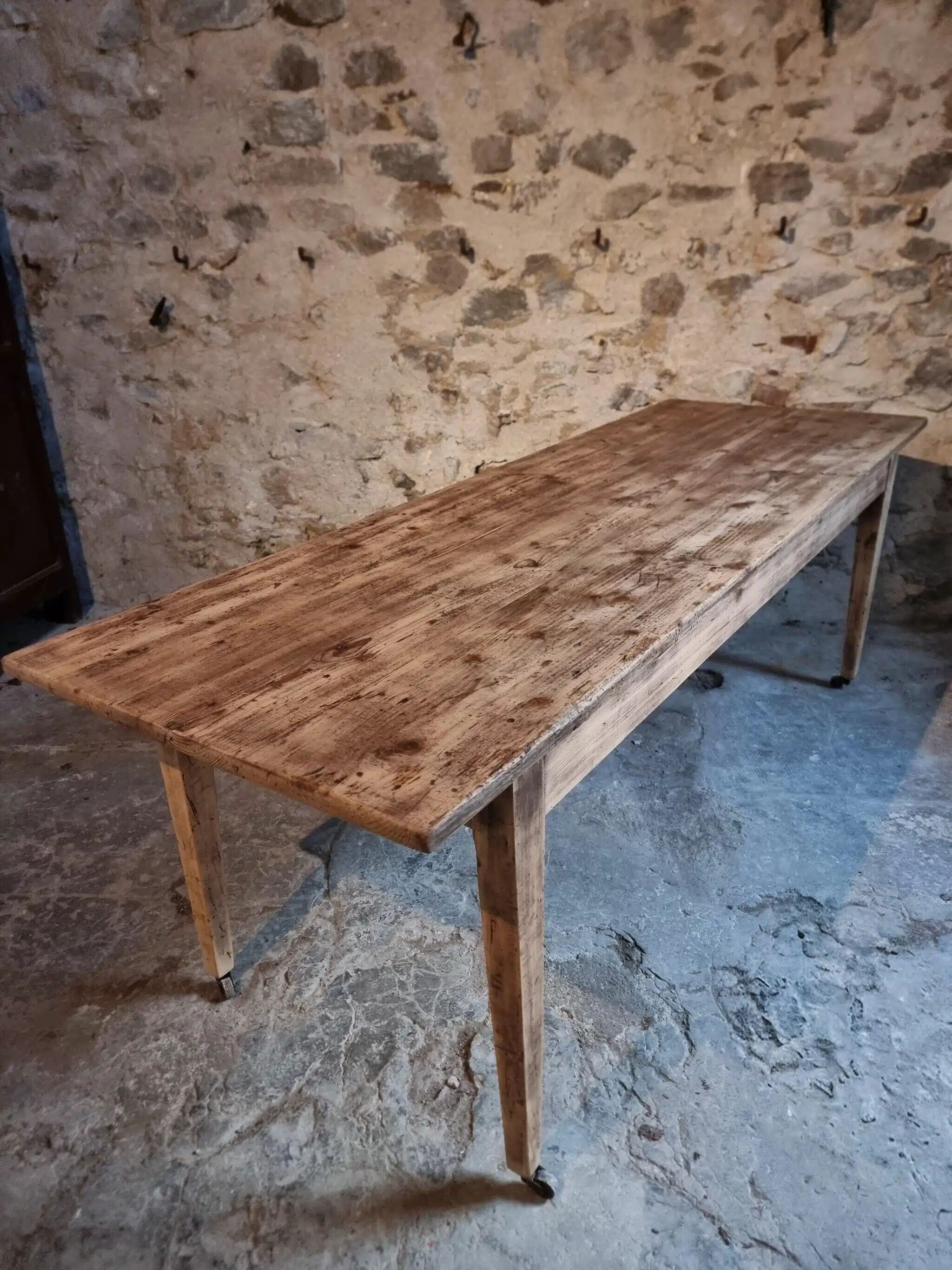 Antique French pine dining table, large farmhouse table on wheels, 19th century.