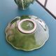 Vintage milk jug with cabbage leaf design in majolica with saucer.