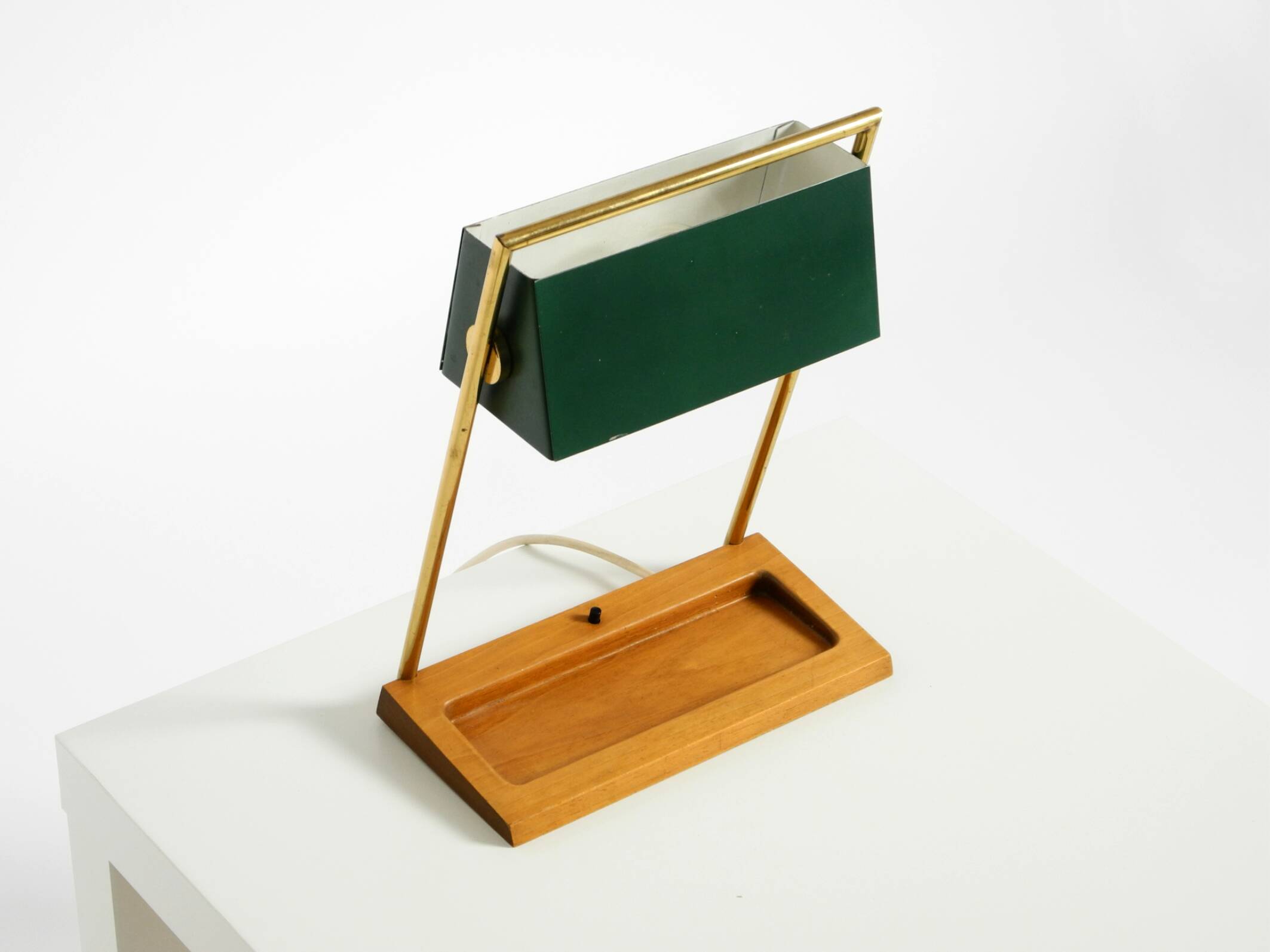 1960s Temde table lamp with a brass frame, teak base, and green lampshade