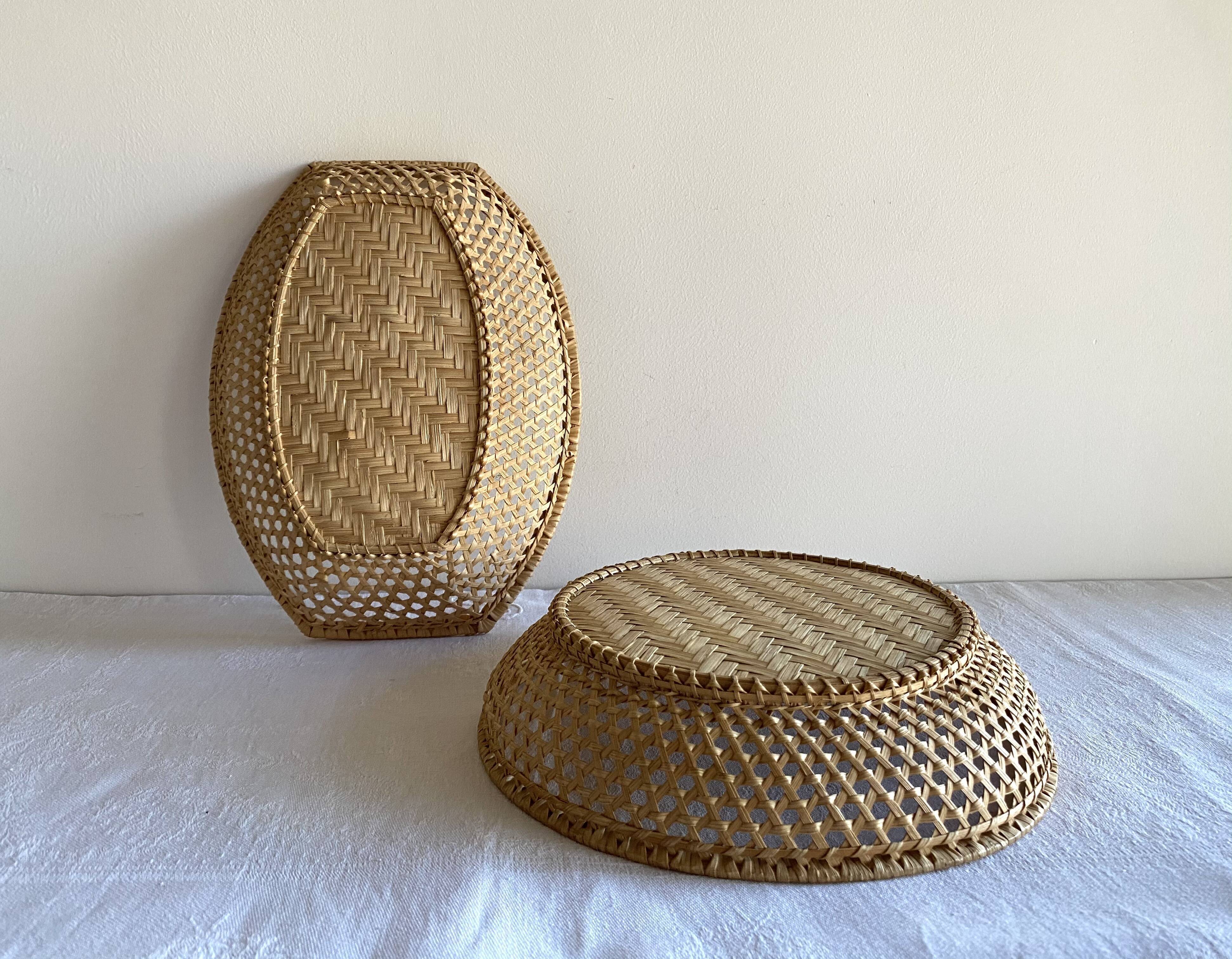 Pair of vintage braided rattan baskets