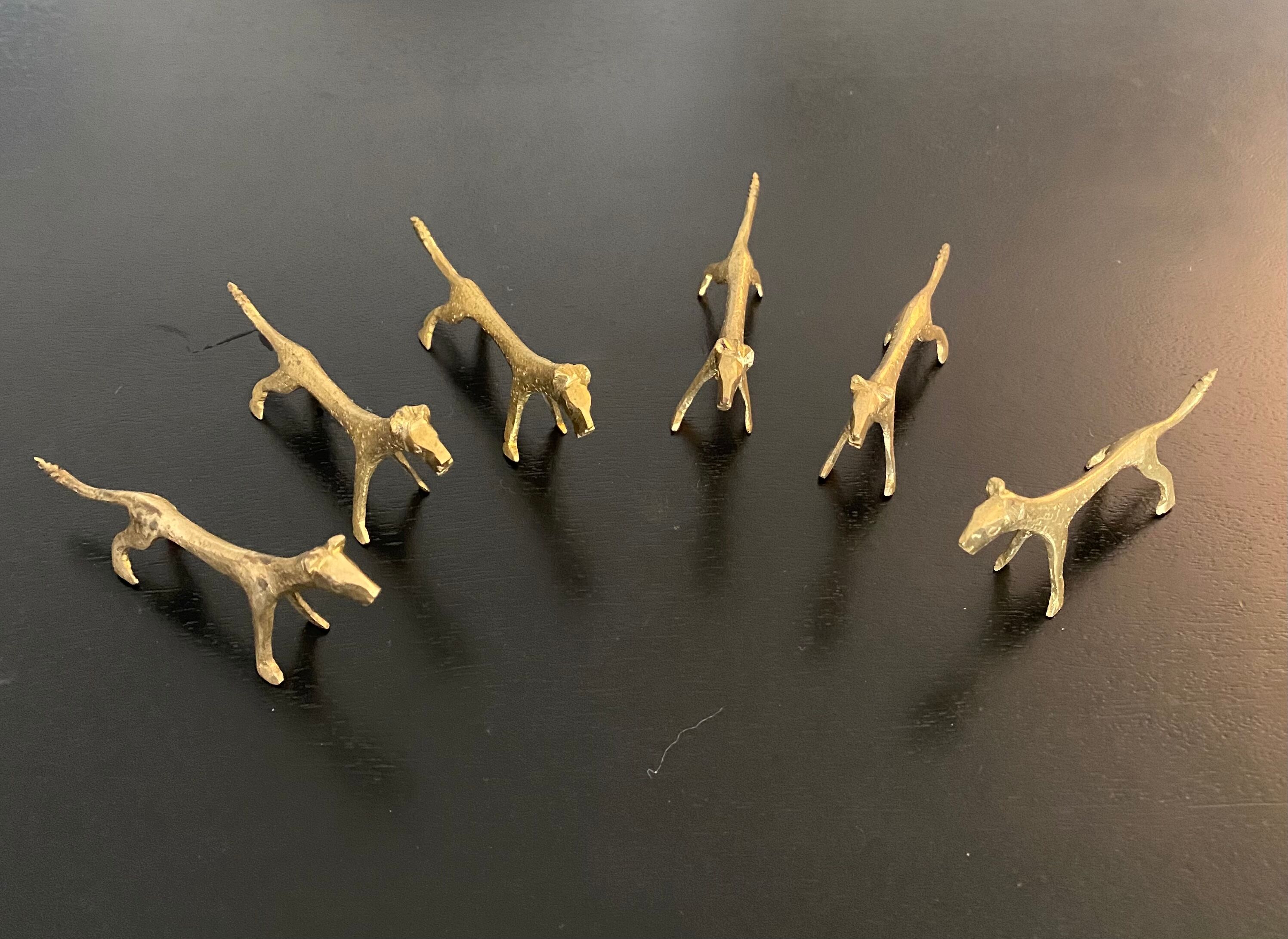 6 lioness-shaped brass knife holders