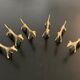 6 lioness-shaped brass knife holders