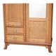 Art Nouveau wardrobe in blond wood with beveled mirror (circa 1909).