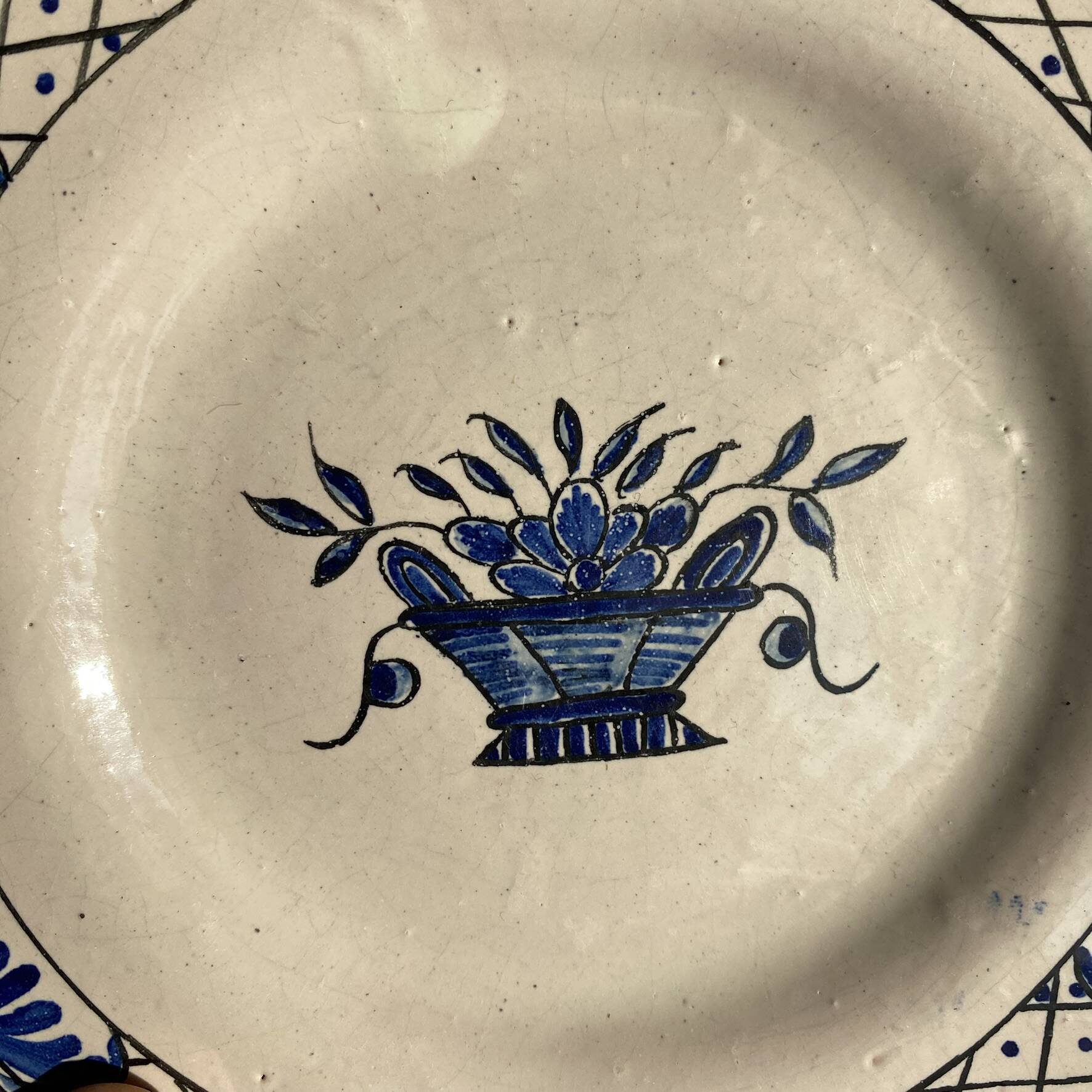 Dessert plates in Rouen faience with hand decoration.
