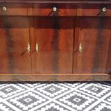 Flamed mahogany enfilade with sea green marble in Empire style.