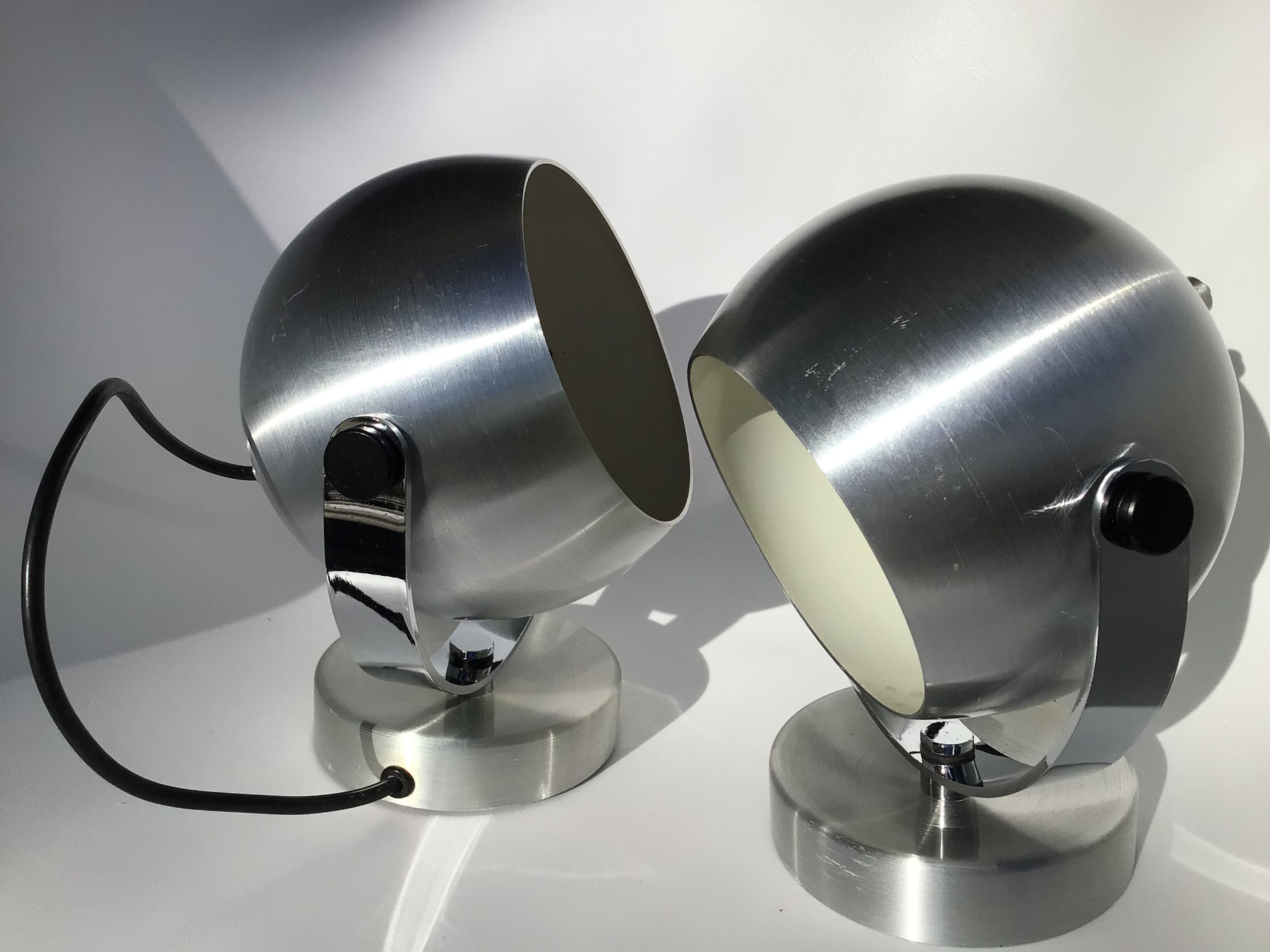 Pair of vintage brushed aluminum eyeball wall lamps