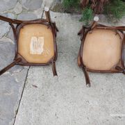 4 bentwood bistro chairs with a pattern on the seat