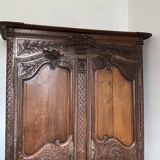 Beautiful and ancient Norman wedding wardrobe, richly carved