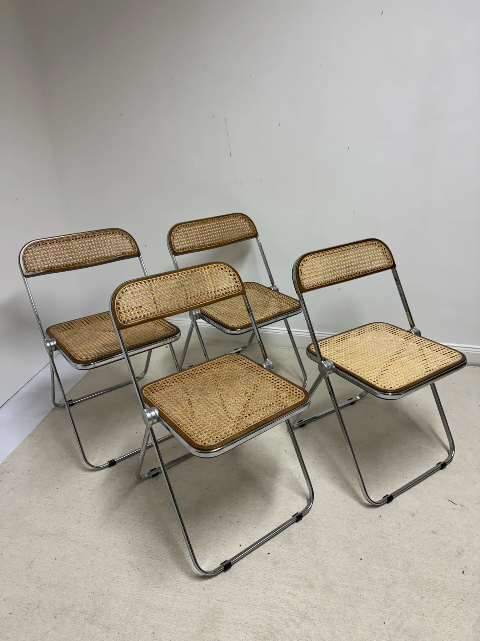 4 chaises Plia par Giancarlo Piretti