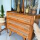 Old vintage wooden and rattan chest of drawers
