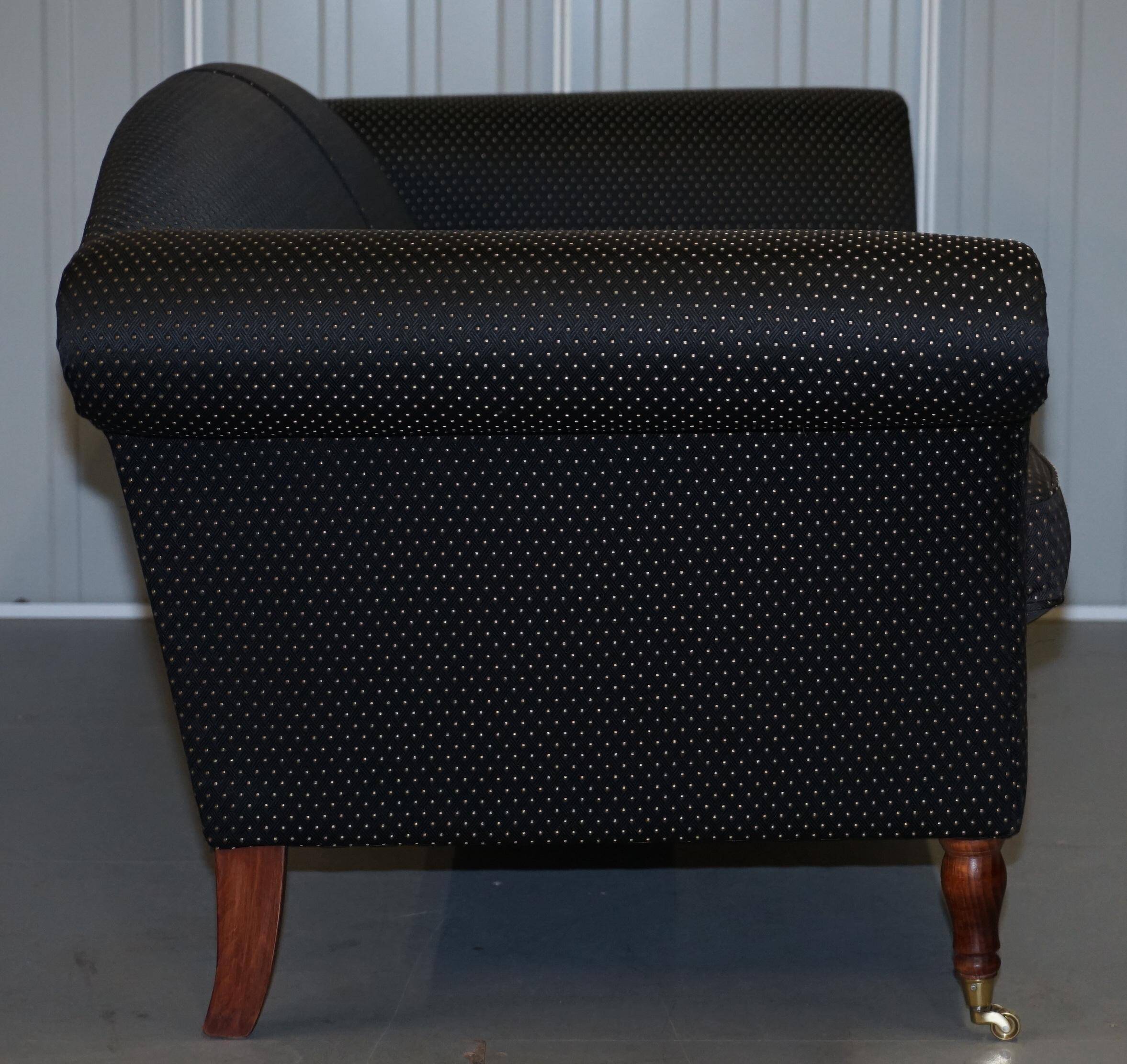 Three-seater Art Deco canapé with a light hardwood frame.