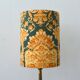 Fabric lampshade with baroque pattern, antique gold leaf design.