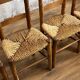 4 Art Populaire chairs in wood and straw